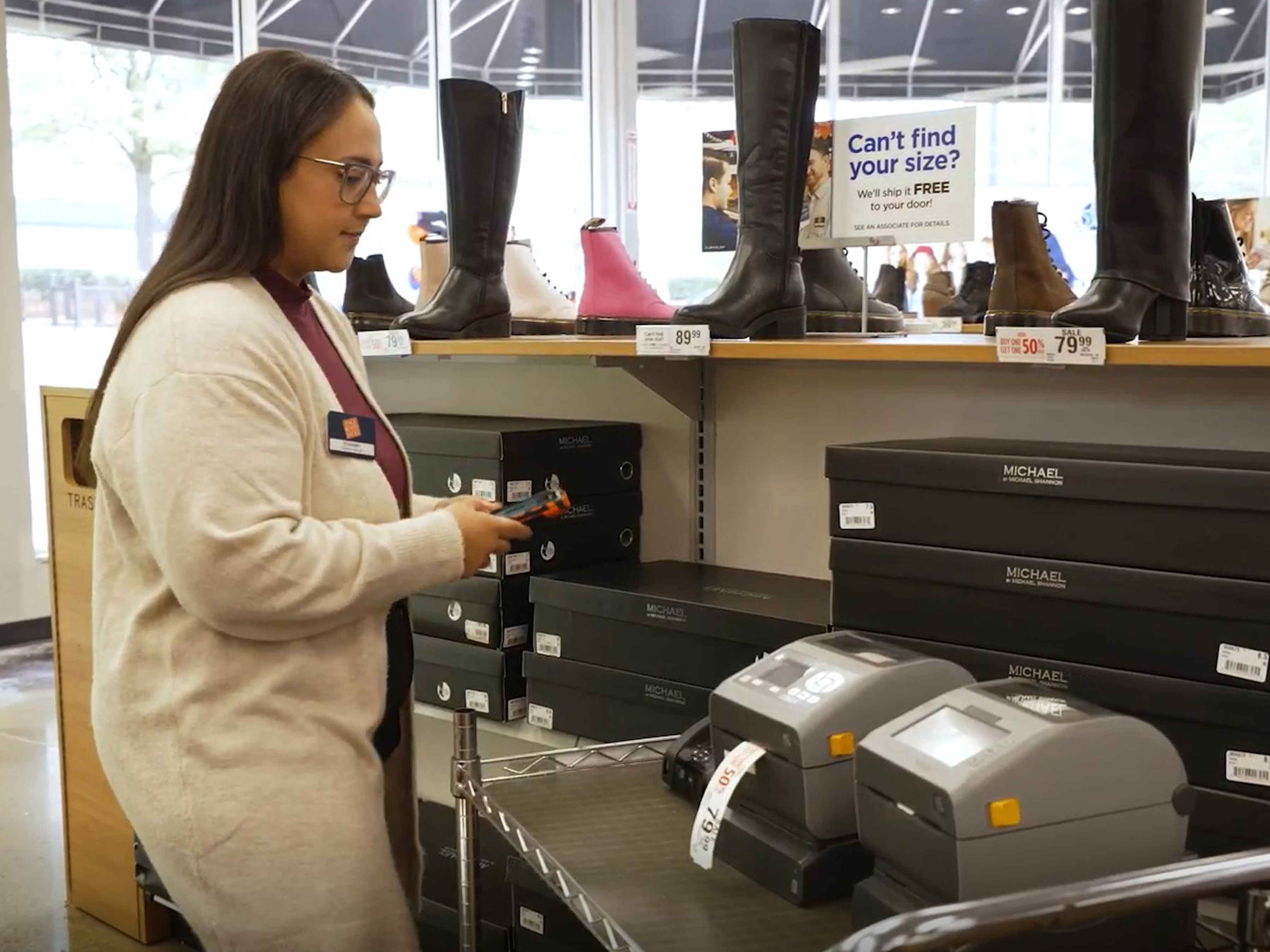 Rack Room Shoes employee with Zebra printers