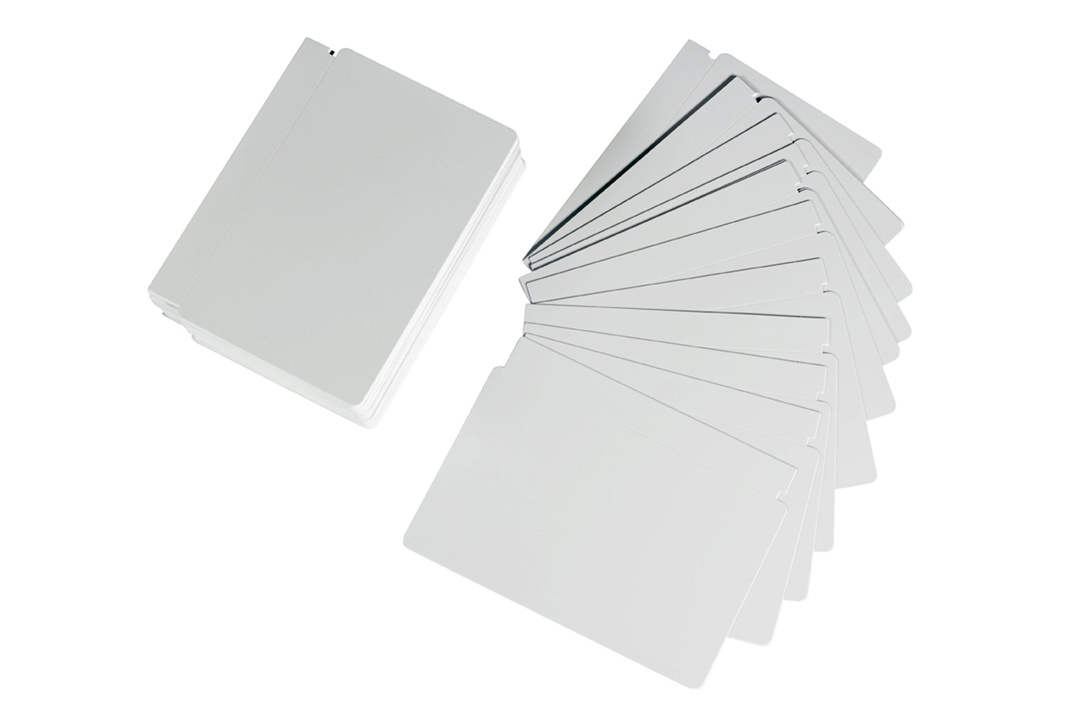 Stack of and fanned out white cards supplies. Stack of and fanned out white cards supplies.