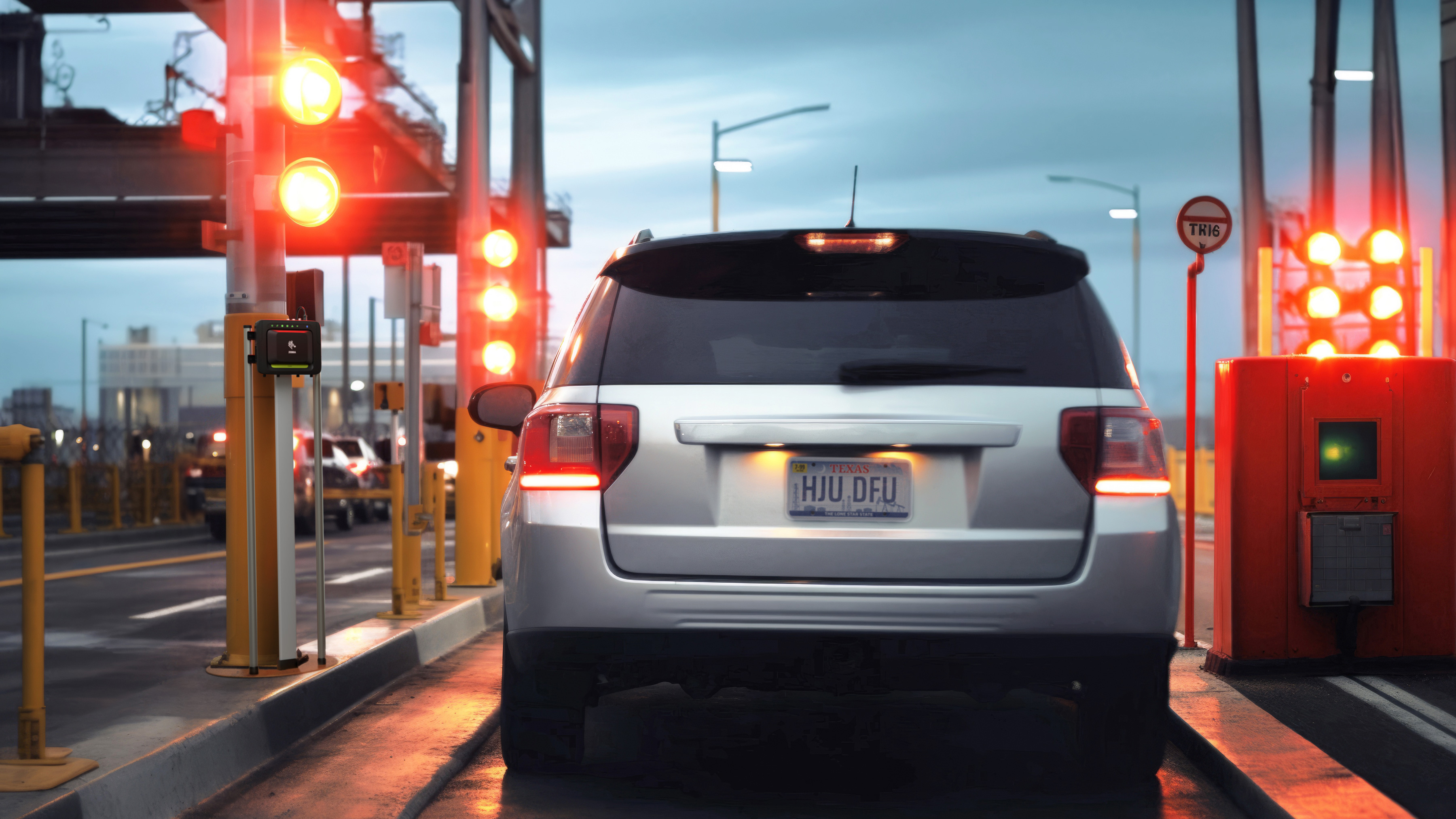 Car stopping on a toll booth with red lights Car stopping on a toll booth with red lights