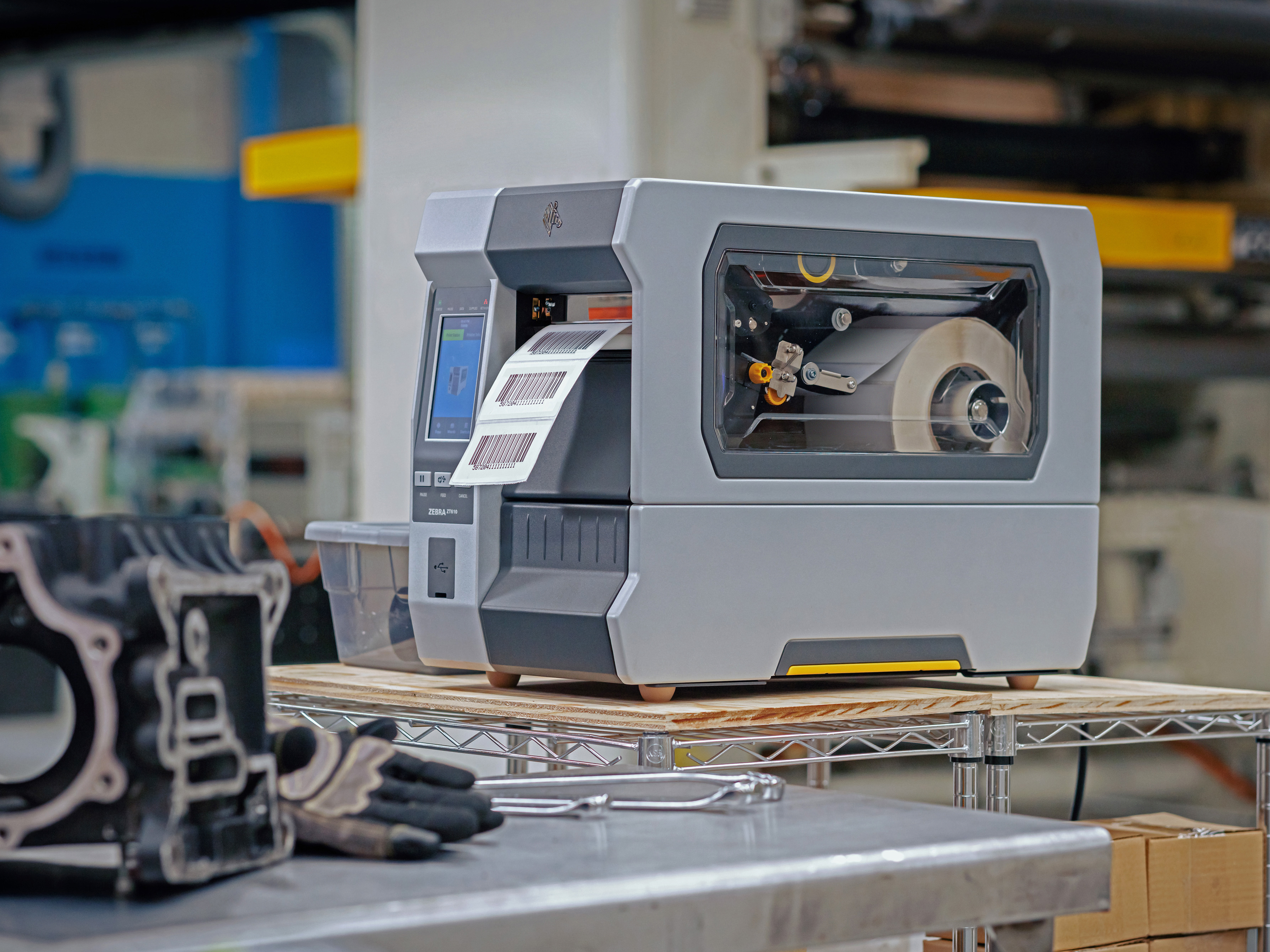 Zebra Industrial Printer in manufacturing setting. Zebra Industrial Printer in manufacturing setting.