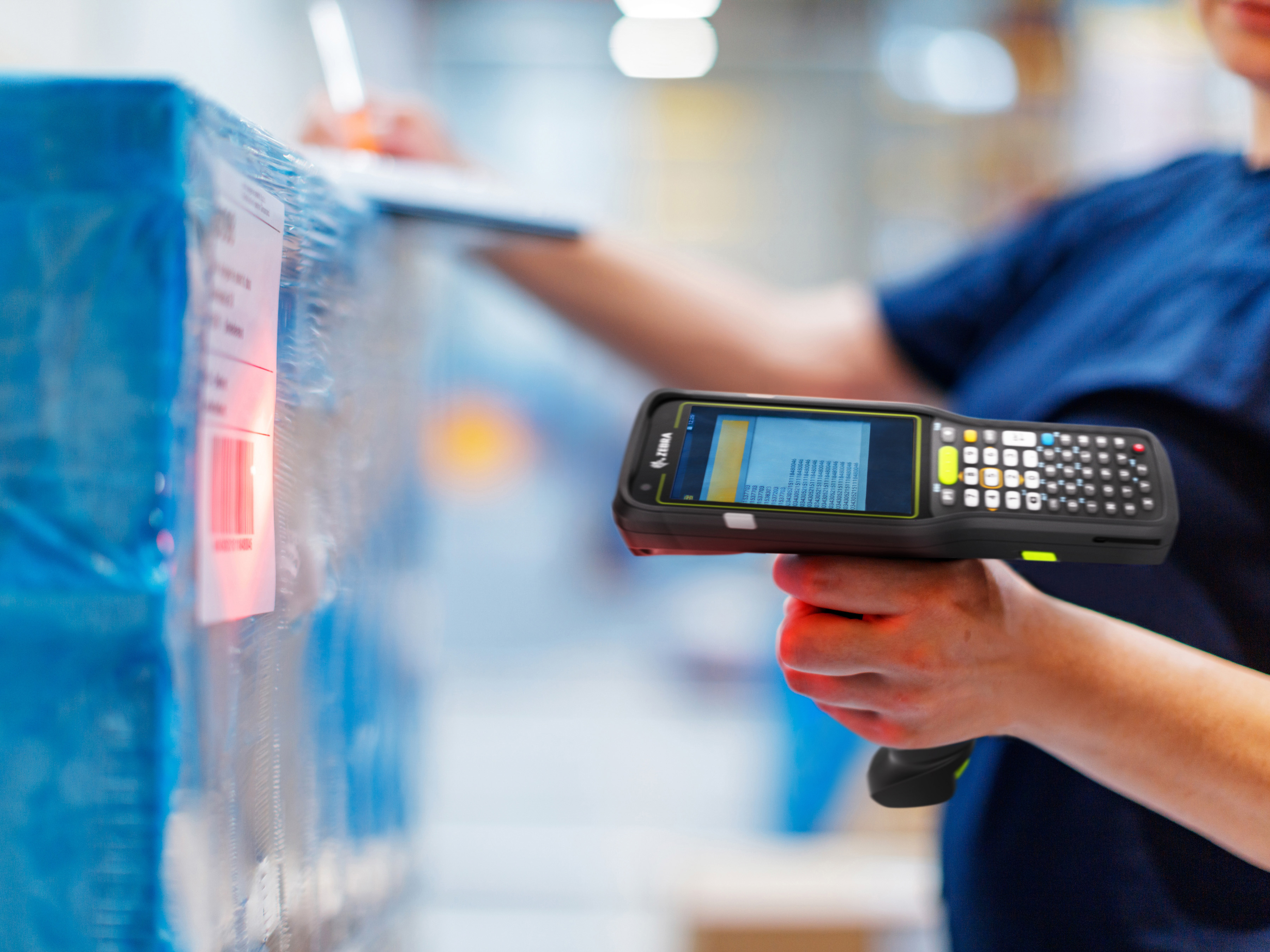 Label being scanned by an employee with a Zebra scanner Label being scanned by an employee with a Zebra scanner