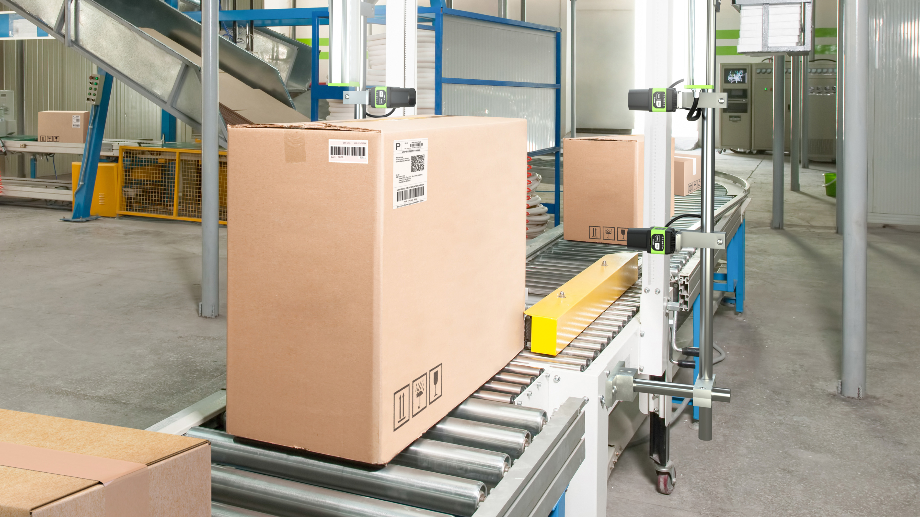 Boxes being sorted at a warehouse Boxes being sorted at a warehouse